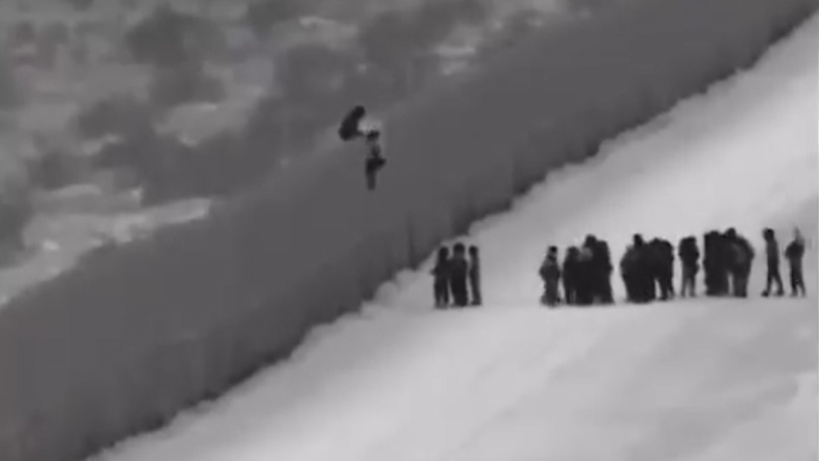 Watch: 110 migrants use ladder to scale border wall in Arizona